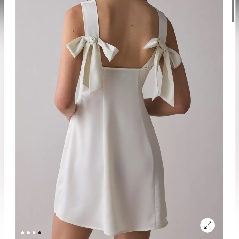 Urban Outfitters Cream Backless Dress with Bow Accents